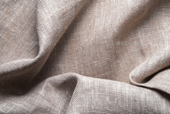 Background of linen napkin folded in folds Stock Photo by Deniskarpenkov