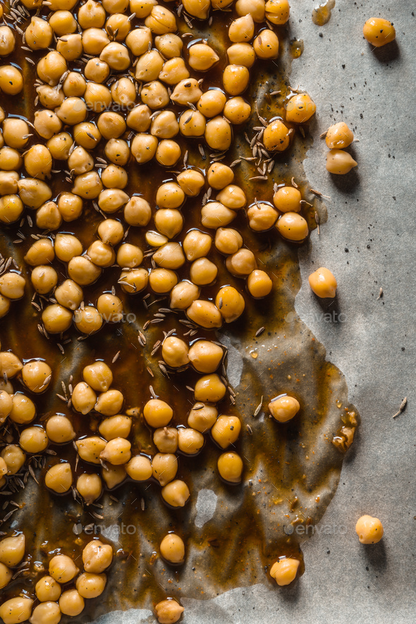 Chickpea with soy sauce on parchment close-up on the left