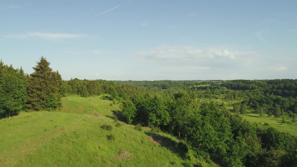 Flight Over River in Meadows