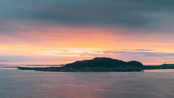 Alesund, Norway. Amazing Natural Bright Dramatic Sky In Warm Colours Above Alesund Valderoya And alt