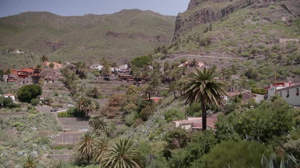 Winding roads and red roof buildings in Masca Gorge - Tenerife - Canary Islands alt
