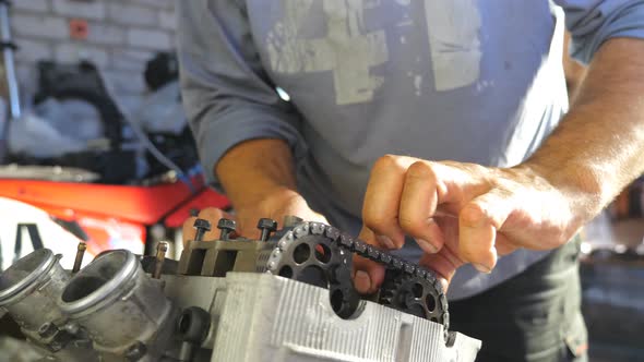 View on Disassembled Motorcycle Engine alt