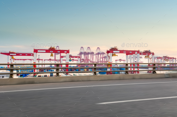 container port with road at dusk