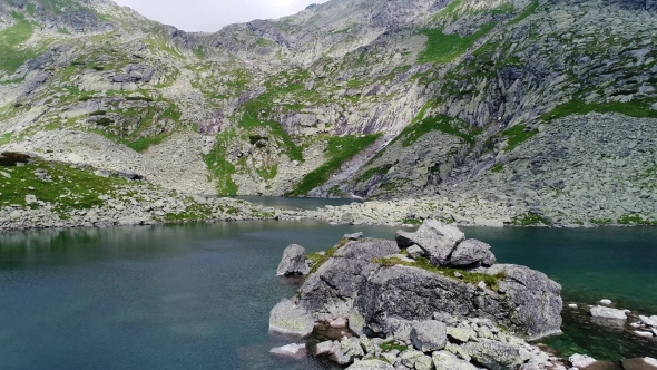 Aerial View of Lake in Mountains