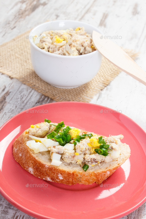 Mackerel or tuna fish paste sandwiches with egg and chives Stock Photo