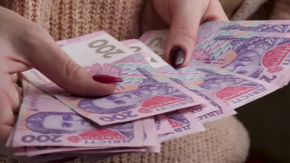 Woman Hands Count Ukrainian Money Hryvnia