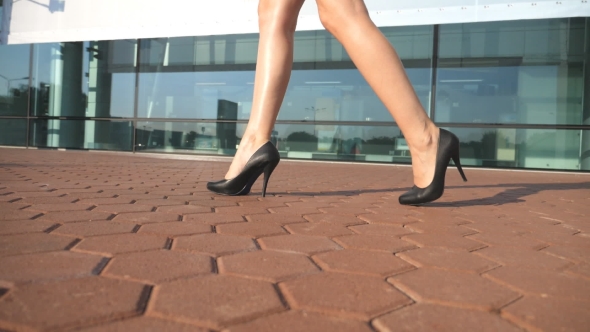 Female Legs in High Heels Shoes Walking in the Urban Street with ...