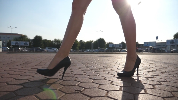 Female Legs in High Heels Shoes Walking in the Urban Street, Feet of ...