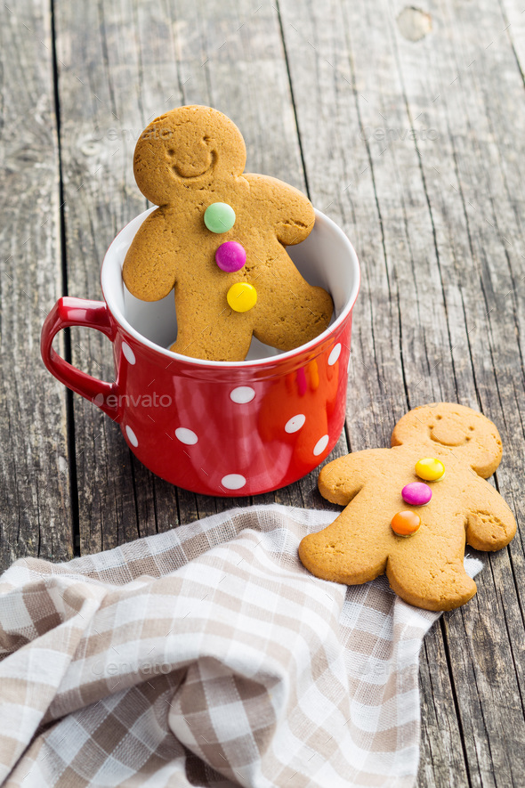 Gingerbread man in mug.