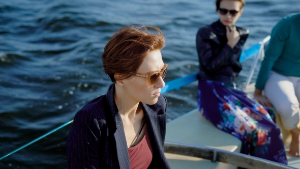 People on Sailboat Spending Time Together and Traveling in Sea alt