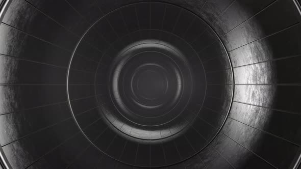 Slow camera movement through a gray metal tunnel. Seamless animation.