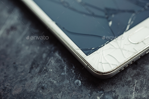 Smartphone with a broken screen. - Stock Photo - Images