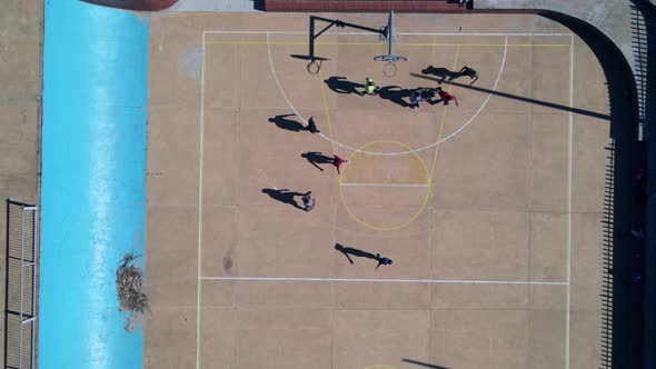 High Angle View of People Seen Playing Basketball
