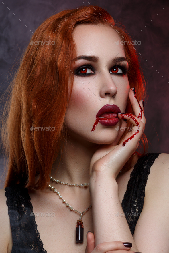 Beautiful vampire young woman
