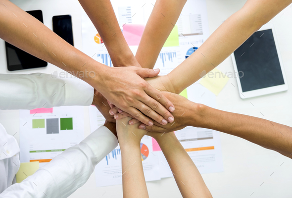 Team staff clasp hands together,Analyst team hands together.