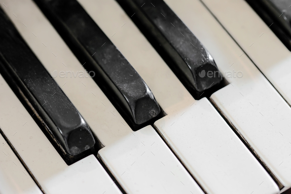 Detail of old, broken and dusty organ keys