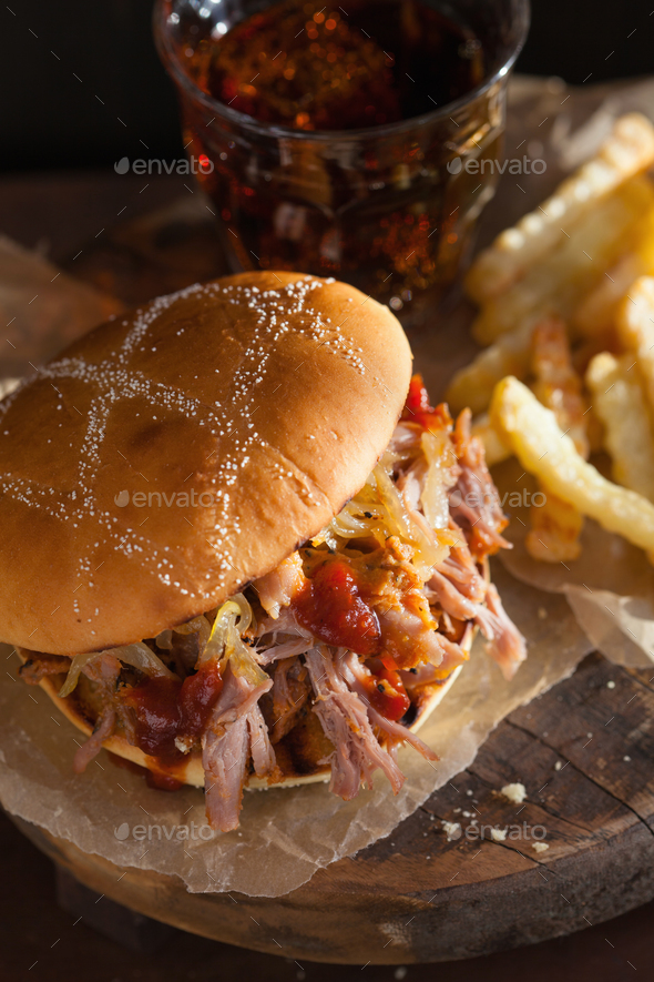 homemade pulled pork burger with caramelized onion and bbq sauce