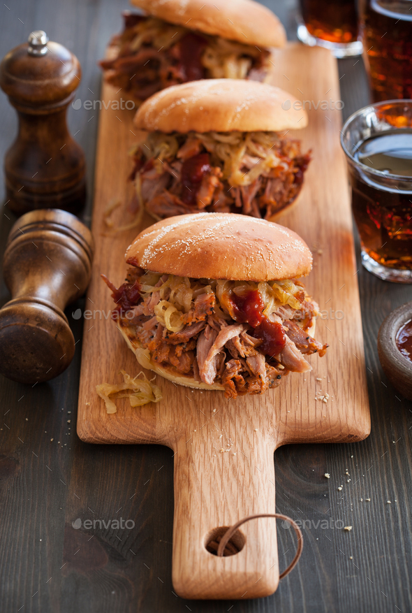 homemade pulled pork burger with caramelized onion and bbq sauce