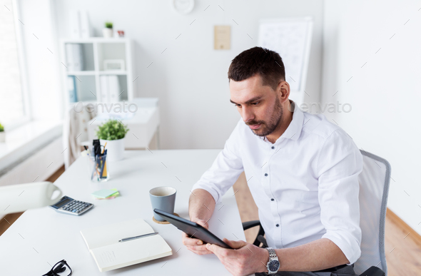 businessman with tablet pc at office