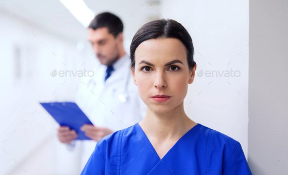 doctor or nurse at hospital corridor