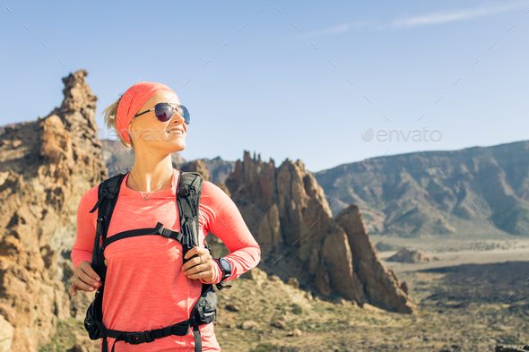 Woman hiker looking at view, backpacker adventure