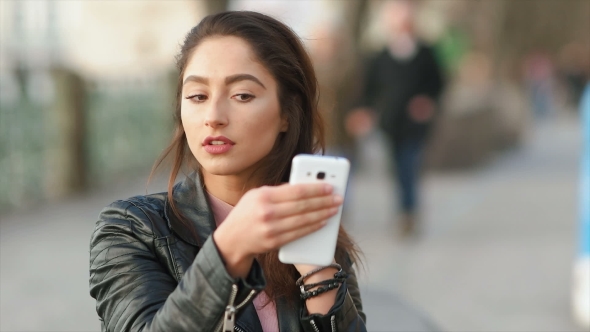 Woman Fixing Her Hair alt