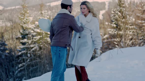 Couple on the Background of Mountains alt