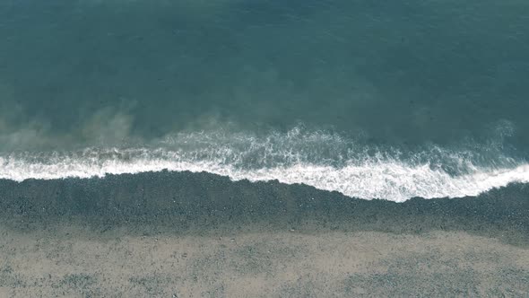 Ocean Waves Splashing On The Shore In Pebble Beach Near The Bray Town, Wicklow, Ireland. - aerial dr alt