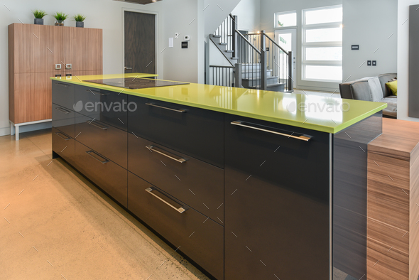 Modern kitchen with green quartz island close-up