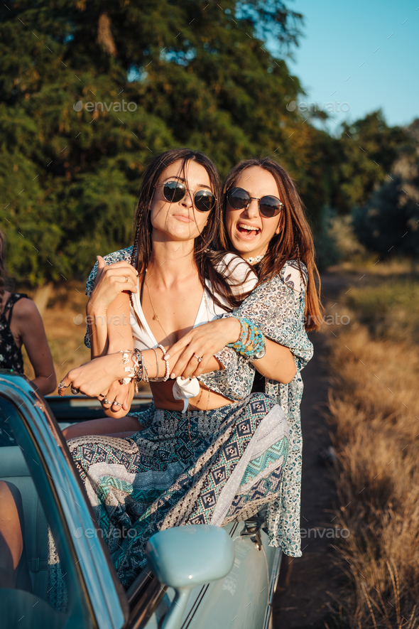 Two girls have fun in the countryside Stock Photo by simbiothy | PhotoDune