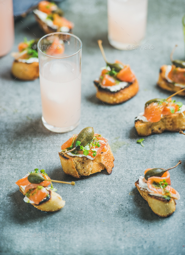 Crostini with salmon and grapefruit cocktails - Stock Photo - Images