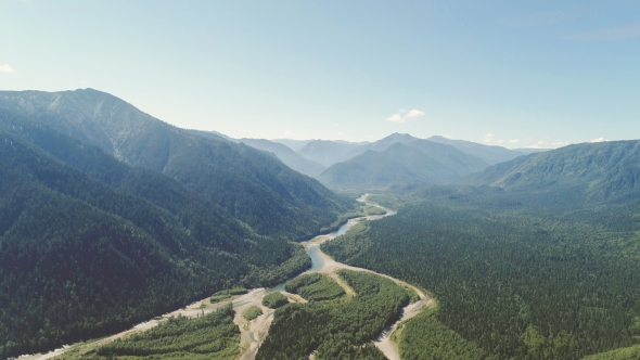 Beautiful Air View on the River Surrounded By Green Valleys on Sunny Day alt