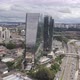 Mirrored two Building and Clouds with Cars and River Drone 4k - VideoHive Item for Sale