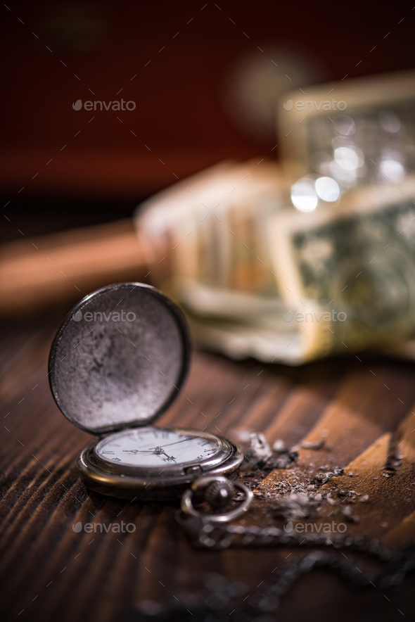 Vintage luxurious watch and dollar money