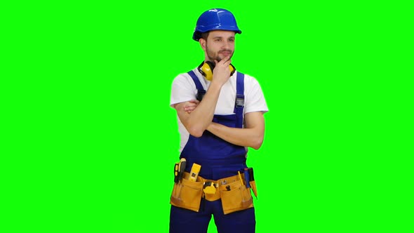 Builder Is Thinking How To Properly Draw a Sketch for Building a Building, Green Screen alt