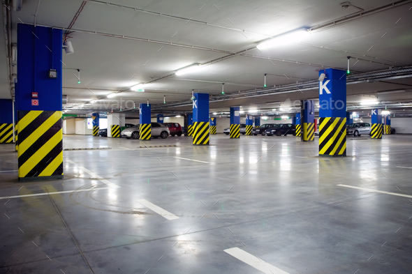 Parking garage of shopping center, underground interior - Stock Photo - Images