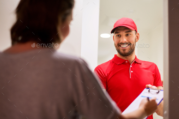 deliveryman with clipboard at customer home