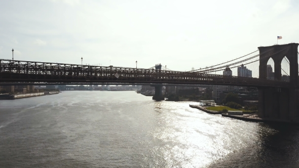Aerial View of the East River in New York, America. Flying Over the Brooklyn Bridge, View on alt