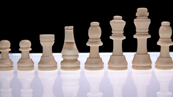 Line of Chess Pieces of White alt