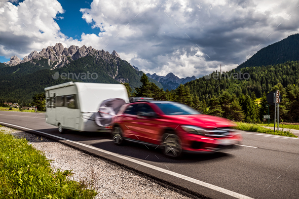 Family vacation travel, holiday trip in motorhome, caravan car motion blur