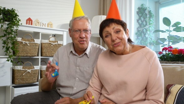 Happy Grandpa and Grandma Congratulate Their Children Happy Birthday Using Laptop Video Call alt