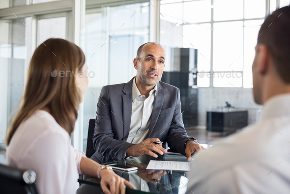 Financial advisor with clients - Stock Photo - Images