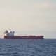 Side View of Cargo Ship Floating in the Sea - VideoHive Item for Sale