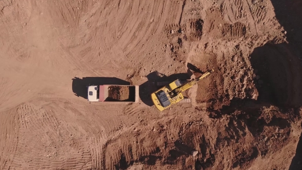 Aerial View of Loading Sand Into Trucks