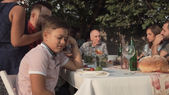 Annoyed Boy on Family Dinner alt