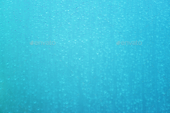 Wet glass surface as background