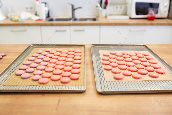 macarons on oven trays at confectionery