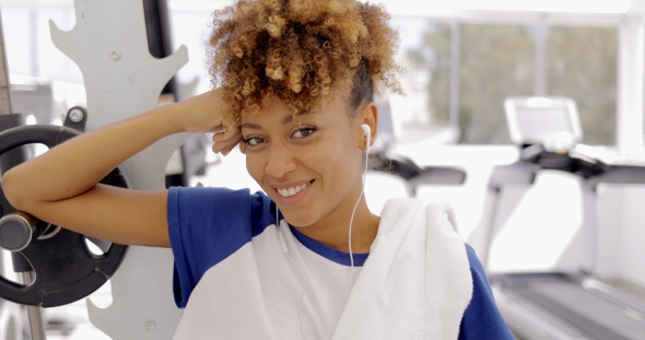 Charming Girl Posing in Gym alt