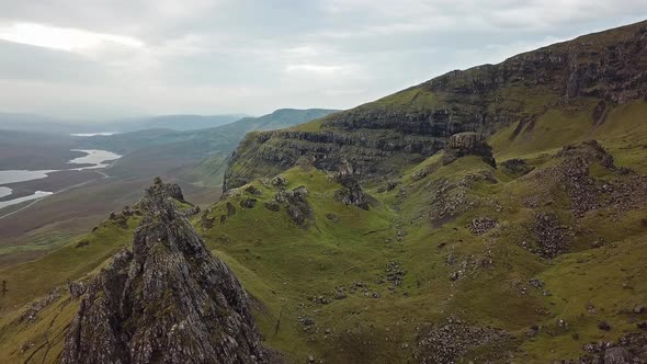 Cinematic Flight Over the Old Man Of Stor in Autumn - Isle of Skye, Scotland alt