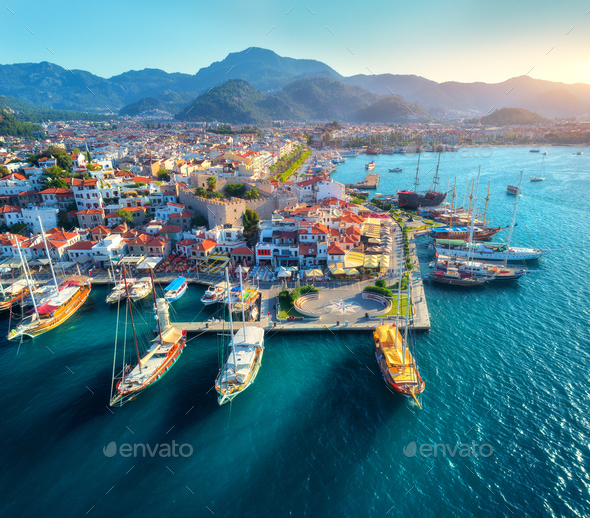 Aerial view of boats and beautiful architecture at sunset